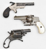 *Grouping of three antique revolvers -