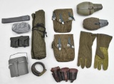 Lot of East German supplies to include gloves, canteens, belts, pouches, etc.