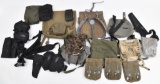 Large grouping of assorted military and other storage bags and carrying pouches.