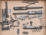 Assorted lot of firearm parts to include,