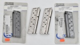 Four 9mm 1911 style pistol magazines.