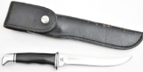 Buck Model 121 fixed blade hunting knife.