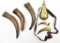 Five powder horns and a brass embossed powder flask.