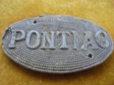 EARLY PONTIAC STAMPED ALUMINUM EMBLEM--LOOKS LIKE ITS FROM THE INTERIOR