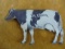 ANTIQUE TIN ADVERTISING COW FROM 