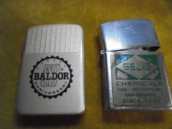 TWO VINTAGE ADVERTISING CIGARETTE LIGHTERS