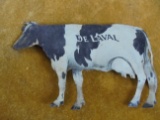 ANTIQUE TIN ADVERTISING COW FROM 