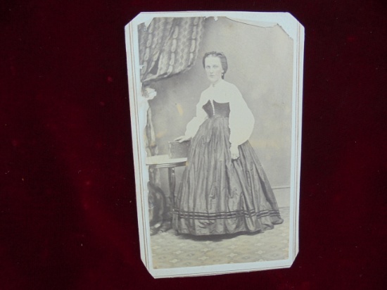 1860'S PHOTOGRAPH OF LADY WITH TWO PROPRIETARY REVENUE STAMPS ON THE BACK