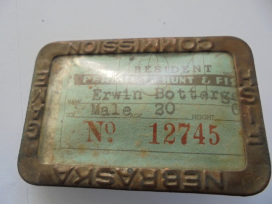 1930'S BRASS NEBRASKA FISH & HUNT LICENSE PERMIT HOLDER WITH 1943 PAPER LICENSE