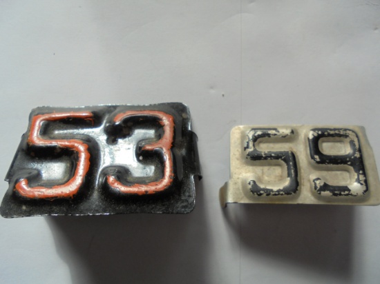 TWO OLD METAL LICENSE PLATE "YEAR" TAGS