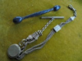 OLD GOLD COLORED WATCH CHAIN WITH LOCKET AND A STERLING BABY TOY