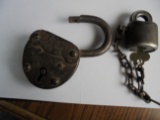 TWO OLD PADLOCKS ONE HAS KEY BUT WE CAN'T GET IT TO WORK