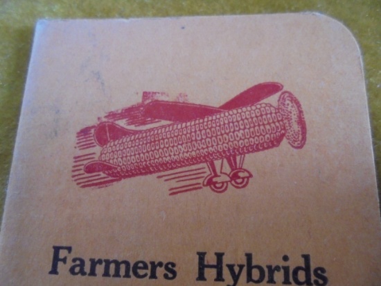 OLD AND UNUSED "FARMERS HYBRIDS" POCKET NOTE BOOK WITH FAMOUS AIRPLANE LOGO