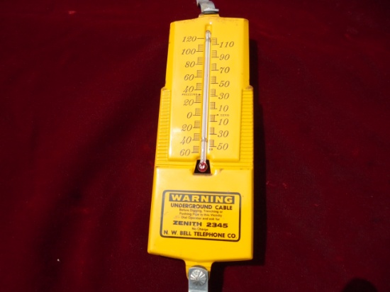 OLD METAL ADVERTISING THERMOMETER FROM "NORTH WESTERN BELL TELEPHONE"--WARNING UNDERGROUND CABLE