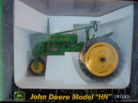 ERTL COLLECTOR EDTION OF A JOHN DEERE MODEL "HN" TOY TRACTOR IN BOX