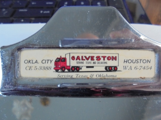 VINTAGE SMALL CHROME CLIP BOARD WITH ADVERTISING FROM "GALVESTON" TRUCKING OF HOUSTON & OLK. CITY