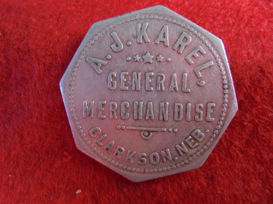 LARGE TRADE TOKEN FOR $1.00 FROM "A.J. KAREL GENERAL MERCHANDISE" CLARKSON NEBRASKA