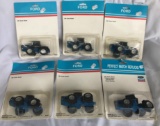 SET OF (6) FORD 4 WHEEL DRIVE TOY TRACTORS -- 1/64 SCALE