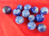 12 OLD BLUE CROCK MARBLES