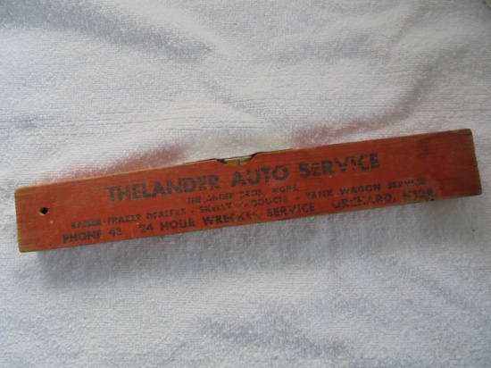 OLD WOOD LEVEL WITH ADVERTISING FROM "THELANDER AUTO" OF ORCHARD NEBRASKA
