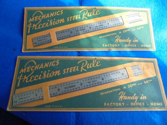 TWO NEW OLD STOCK STEEL RULES ON CARDBOARD ADV. STOCK
