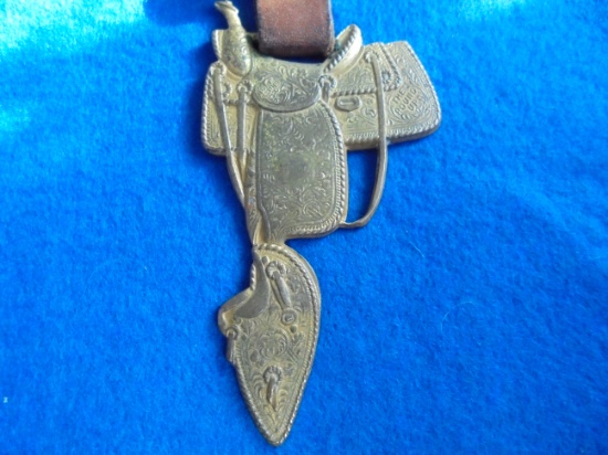 VINTAGE "ROUND UP SADDLE" ADVERTISING WATCH FOB-QUITE NICE
