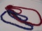 STRINGS OF GLASS BEADS---RED AND BLUE