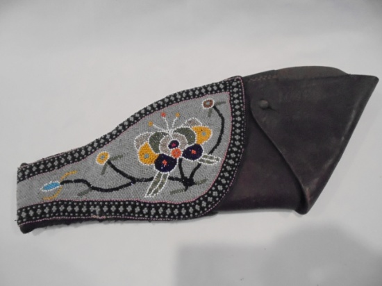 38 COLT LEATHER HOLSTER WITH BEADWORK ON BOTH SIDES