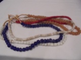 4 STRANDS OF GLASS BEADES-WHITE-BLUE-GOLD-& RED