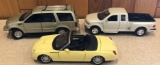 (3) 1/24 Ford Vehicles - Expedition, F-150, and Thunderbird