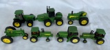 LOT OF (7) JOHN DEERE 1/64 TOY TRACTORS