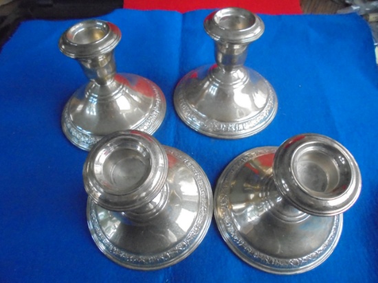 (4) MATCHING CANDLE HOLDERS-STERLING WEIGHTED-4 TIMES MONEY