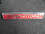 OLD INTERNAIONAL TRUCK EMBLEM-8 1/4 INCHES LONG