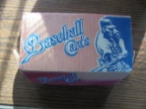 BOX OF UNSORTED BASEBALL CARDS-7 INCHES WORTH