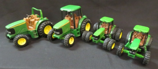 (4) John Deere Plastic Tractors