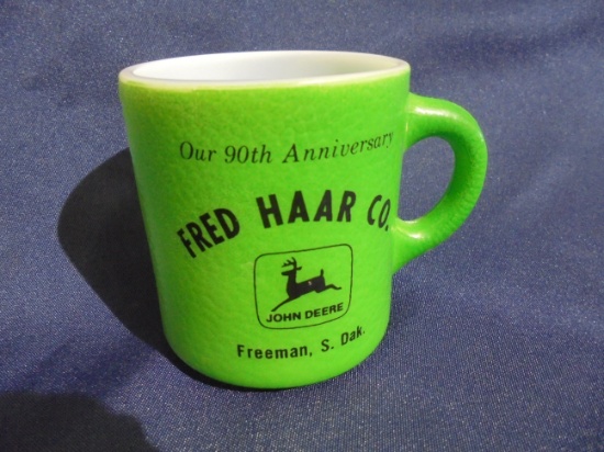 1972 DATED JOHN DEERE ADVERTISING COFFEE MUG FROM FREEMAN, S.D.