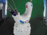 OLD HAT PIN HOLDER THAT LOOKS LIKE A BIRD---WITH SOME HAT PINS
