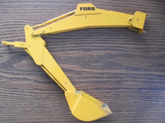 OLD TOY BACK HOE ATTACHMENT MARKED "FORD"