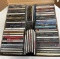 Over 70 CD's --- Elvis Presley, ZZ Top, Jimmy Buffet, and More