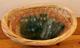 BASKET WITH (8) VINTAGE BLUE JARS