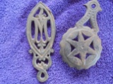 (2) SMALL TRIVETS ONE WITH STAR & THE OTHER WITH 