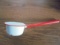 OLD RED AND WHITE ENAMEL LADLE OR DIPPER