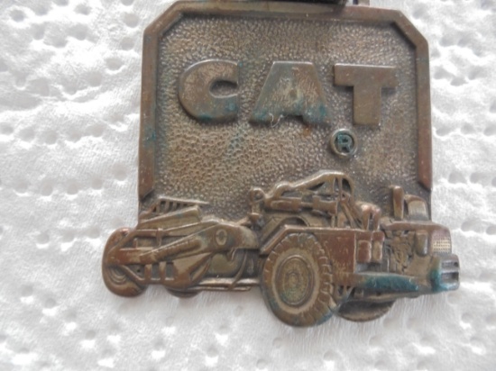 OLD ADVERTISING CAT WATCH FOB WITH ADVERTISING FROM SOUTH DAKOTA DEALER