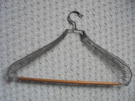 ODD ANTIQUE COAT HANGER-WOOD WITH WIRE COIL