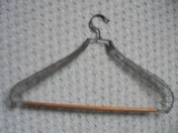 ODD ANTIQUE COAT HANGER-WOOD WITH WIRE COIL