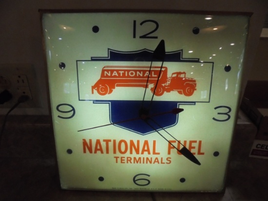 VINTAGE ADVERTISING CLOCK FEATURING "NATIONAL FUEL TERMINALS" WITH EARLY TRUCK GRAPHIC - PAM CLOCK