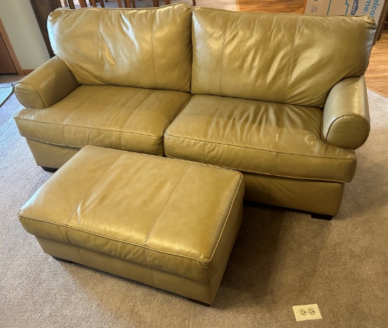 TAN LEATHER COUCH WITH MATCHING OTTOMAN.