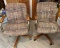 2 CASTERED ARM CHAIRS