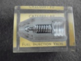 OLD ADVERTISING SALES SAMPLE OF AN INJECTOR FROM 