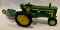 JOHN DEERE TWO-CYLINDER TRACTOR WITH 4 BOTTOM MOUNTED PLOW